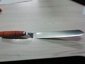 Купить: Нож Павик зубчатый 205мм 